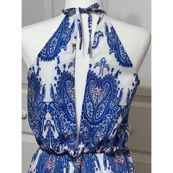 FuGui.xing sunsuit Size M short jumper. Floral design. Cold shoulder sleeveless - Picture 4 of 5